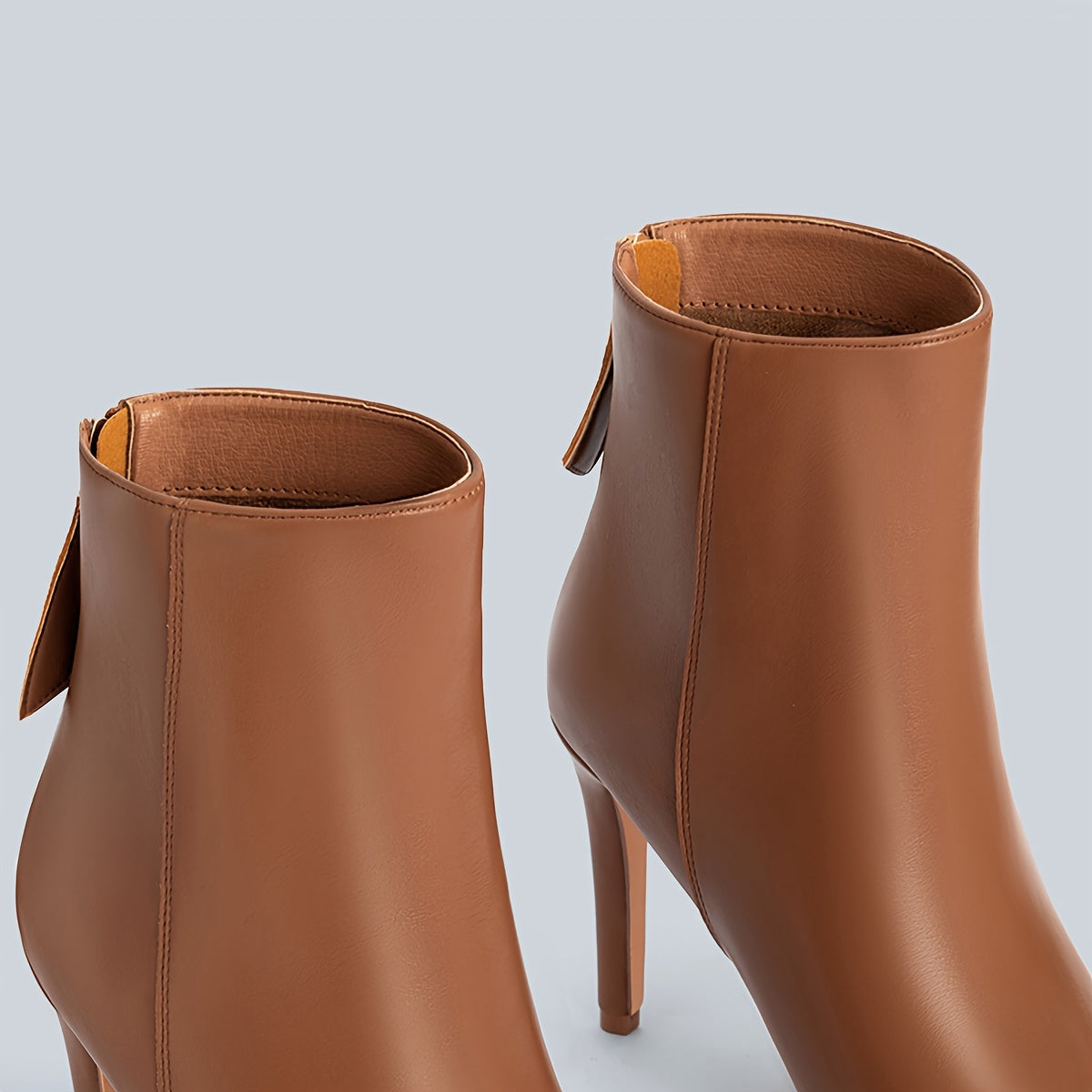 Sculpted Heeled Ankle Boots with Sleek Pointed Toe